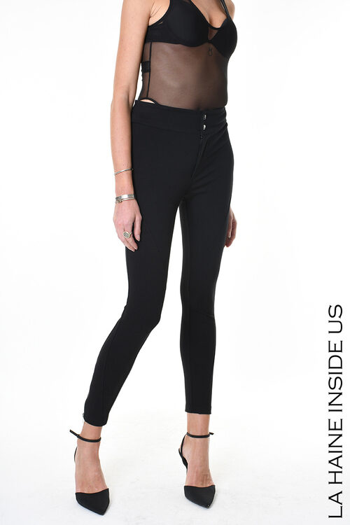 Melnas pieguļošas bikses ar augstu jostasvietu